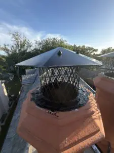 custom rain cap for a clay chimney topper