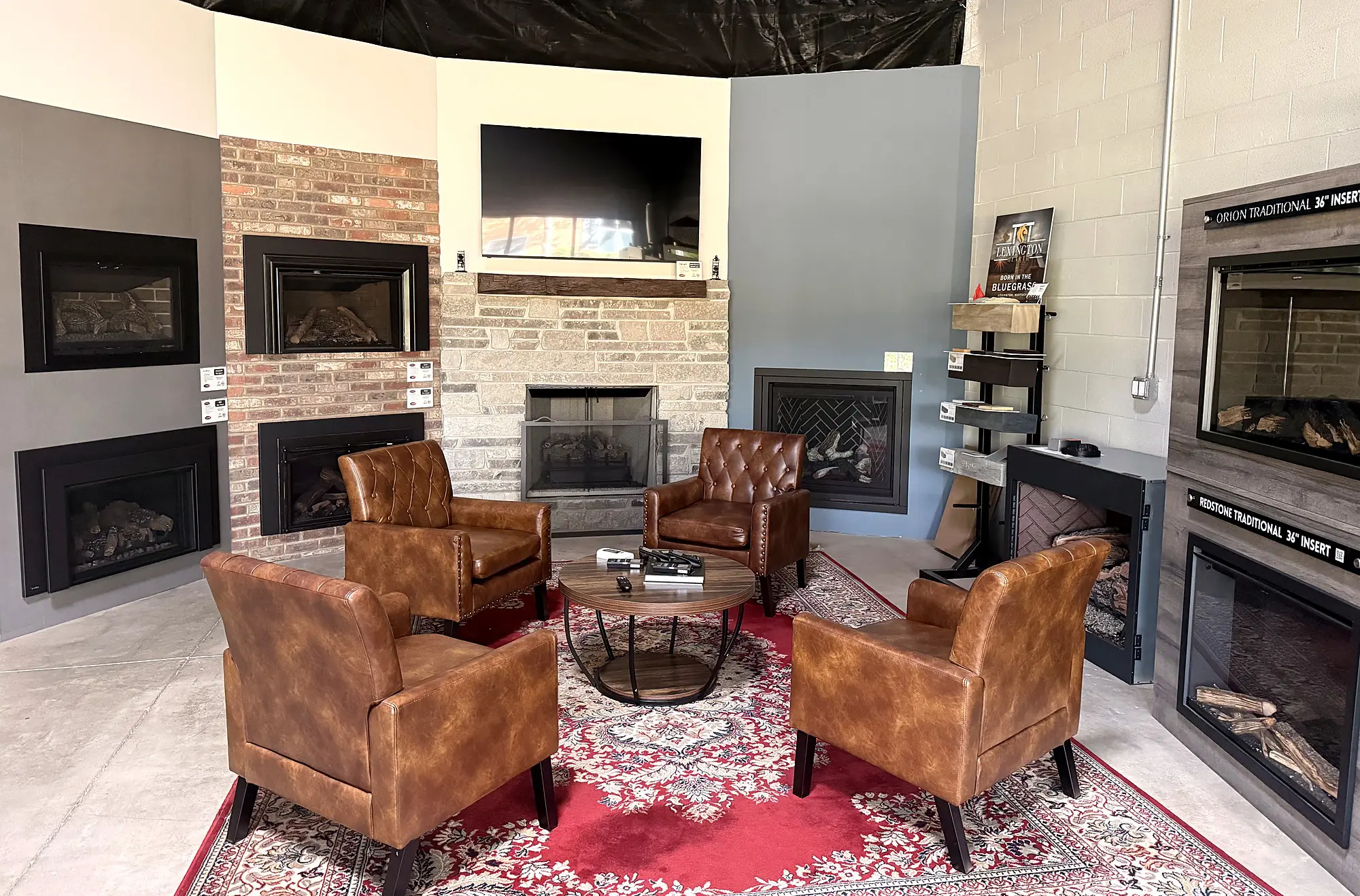 Leather seating and fireplace surrounds in the Heat Crafter display room