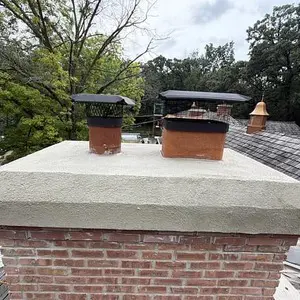 New concrete chimney crown with an overhanging drip edge after a full crown rebuild in Tower Lakes