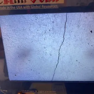 Chimney camera view of cracked and flaking clay flue tiles inside a Mundelein chimney
