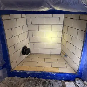 Newly rebuilt refractory brick firebox inside a masonry fireplace in Glencoe, IL