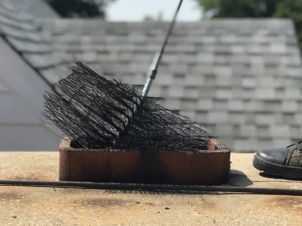 Chimney sweep brush, crown and clear flue after a Chimney Monkey sweep on the North Shore